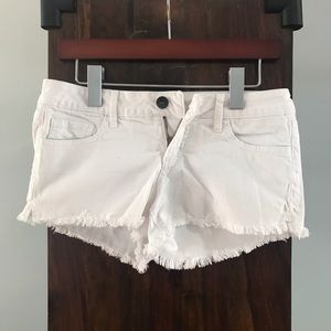 White Distressed Denim Shorts.